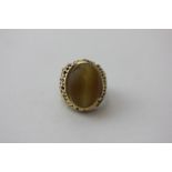 A 9ct gold and tiger's eye dress ring