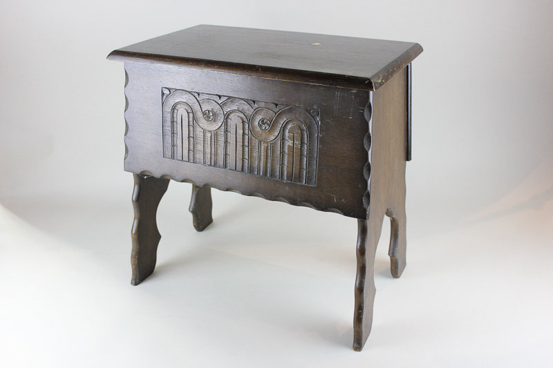 An oak needlework table with carved front, 43cm, (SPM)