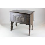 An oak needlework table with carved front, 43cm, (SPM)