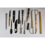 A collection of twelve various paper knives, wooden ruler and a penknife, (SPM)