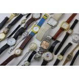 A large collection of various wrist watches