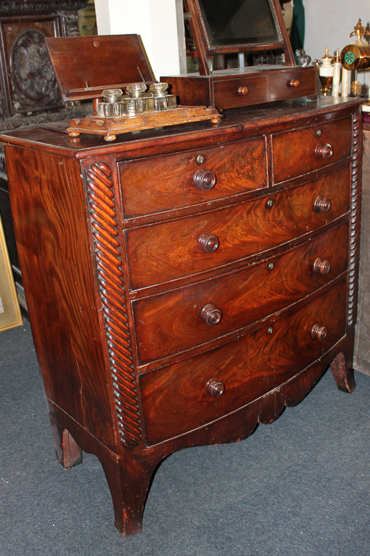 A Victorian mahogany bow front chest of two short and three long drawers, 114cm