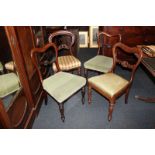 A pair of Victorian dining chairs with scroll supports, together with a similar chair and a