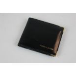 A black leather wallet inscribed in gilt 'Patrick Moore', (SPM)
