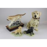 A Leonardo collection model of a Labrador 'Walkie's', an Albany fine china Labrador on wooden base