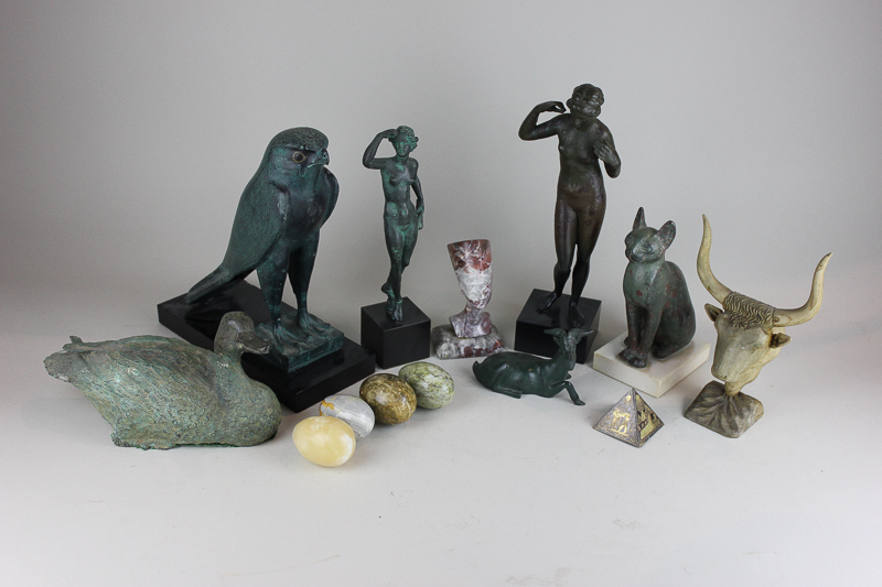 Eight museum replica ornaments including models of Egyptian gods and Grecian statues, together