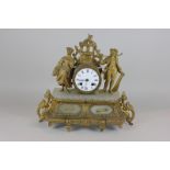 An ormolu and onyx mantel clock decorated with figures off harvesters, white enamel circular dial