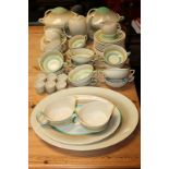 A Susie Cooper part dinner and tea service including two vegetable tureens, two serving platters,