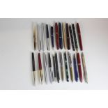 A collection of fountain and ball point pens, various makers including Conway, Parker, Osmrod, and