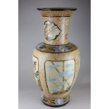 A large Japanese style pottery baluster shaped vase with panels of floral decoration, 66cm high