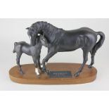 A Beswick Connoisseur model of Black Beauty with foal, on wooden base
