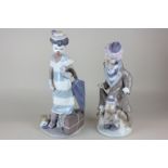 Two Lladro porcelain figures of clowns with dogs, On the move (5838) and Surprise (5901), tallest