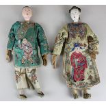 Two 19th century Chinese Cantonese porcelain head dolls of a man and a woman with composite