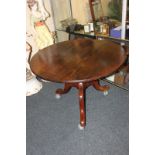 A George III circular tripod table with tilt top (later adapted), 83cm