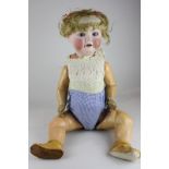 A German bisque socket head doll, possibly by Portham & Sohn, marked made in Germany P & S, with