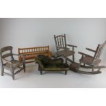 A doll's double rocking chair, armchair, bench and chaise longue