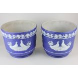 A pair of Victorian Wedgwood cobalt blue Jasperware jardinieres with acorn and dove decoration, 21cm