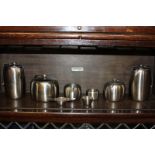 A mid 20th century Old Hall stainless steel tea set with two teapots, two hot water jugs, a milk