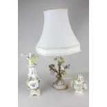 A Capodimonte porcelain table lamp with bocage flowers and ormolu stems and leaves, a Coalbrookdale,