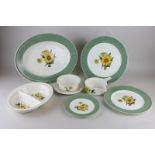 A Wedgwood sunflower pattern part dinner service for four, including platter, dinner, dessert and