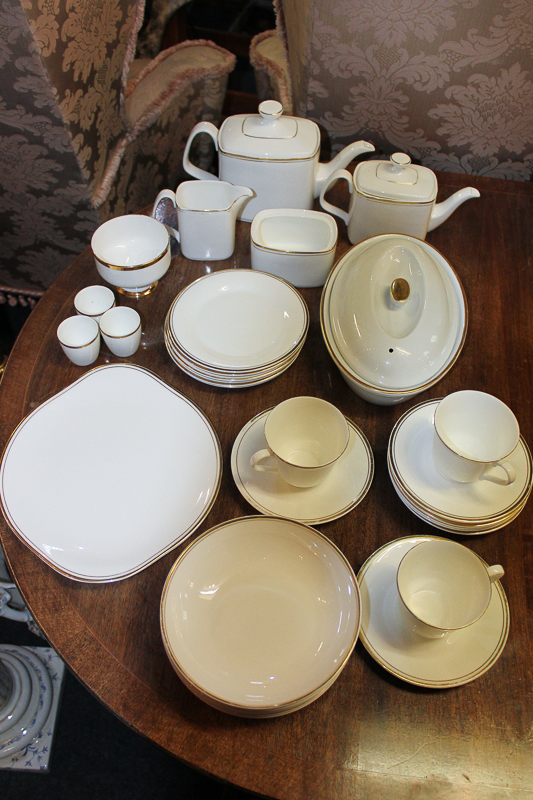 A Royal Doulton Gold Concord porcelain part breakfast and tea service including two teapots, three