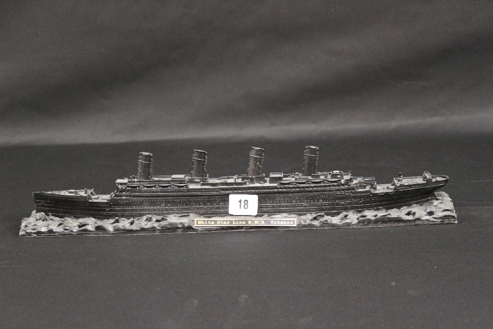 R.M.S. TITANIC: Modern model of the Titanic made from deep cast coal. 18½ins. Ex. Brian Ticehurst