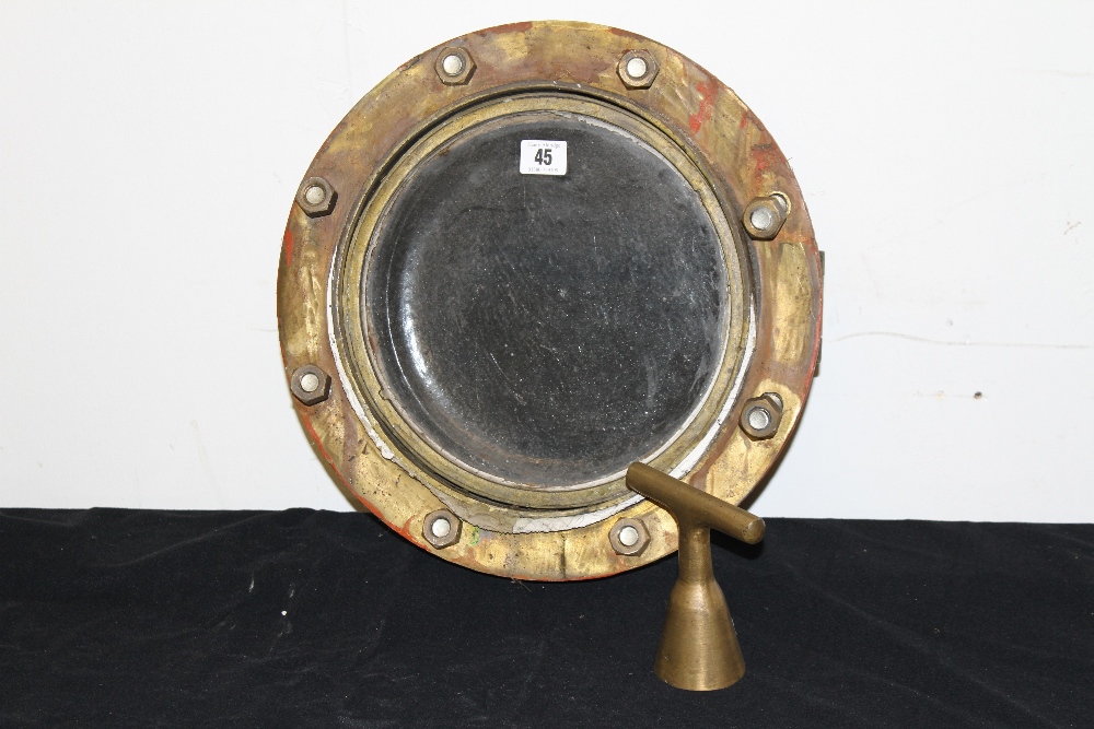 OCEAN LINER: Brass porthole reputed to be from the Mauretania 16ins. Together with an unrelated