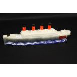 R.M.S. TITANIC: Unusual Paul Lux, Colonial china, novelty ceramic Titanic whisky bottle. 17ins.