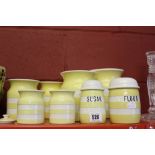 T.G. Green Cornish ware: Yellow and white storage jars 1 x 7", 1 x 6", 2 x 5", 2 x 3½" (one with a