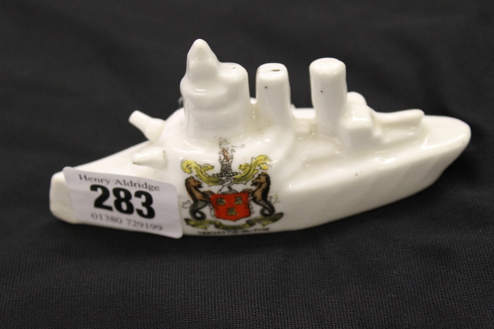 20th cent. Ceramic souvenir ware W.W.I battleship Newcastle-on-Tyne with the city crest.