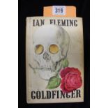 Ian Fleming - "Gold Finger", first edition with dust jacket faded & light staining.