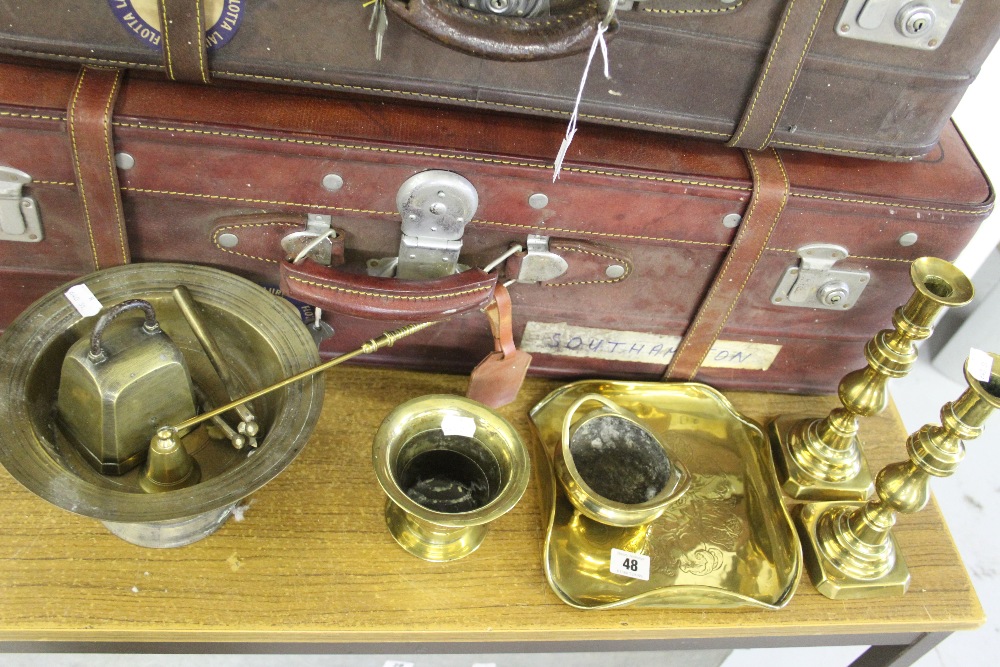 Late 19th early 20th cent. Brassware: Candle holders - a pair, candle snuffers, cowbell, mortar,