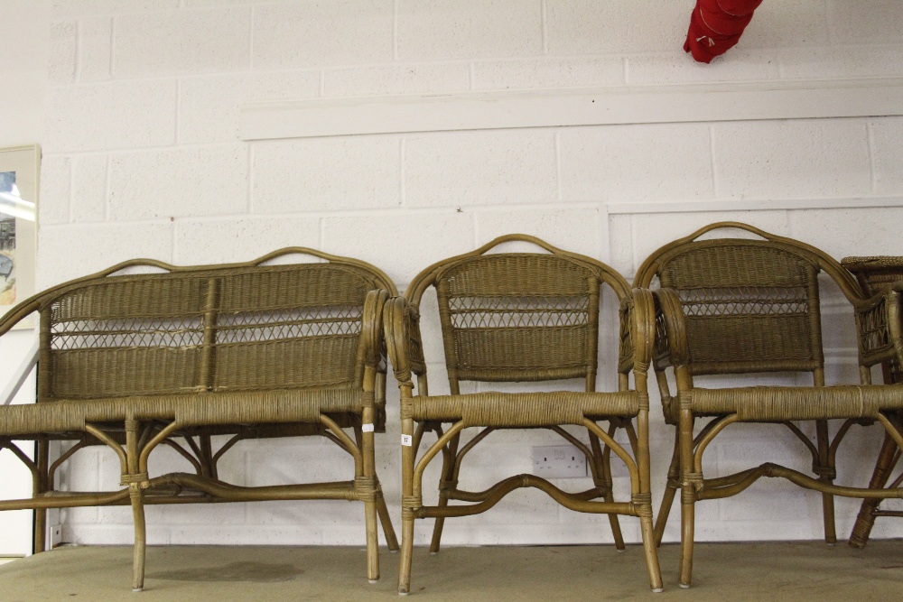 20th cent. Cane bentwood conservatory suite consisting of a two seater settee & two matching chairs.