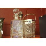 Hallmarked silver: Cut glass decanter with silver collar, London + 1 other cut glass decanter and