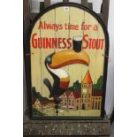 Advertising: Treen pub sign for Guinness Stout with a toucan balancing a pint on its beak. 2' x 3'.