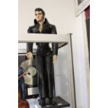 Elvis Presley: Bisque porcelain figure on stand in black leather come back outfit. C1985, only 8