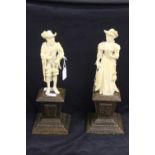 19th cent. Dieppe Ivory carved figurines of a gentleman and his lady. 7" on treen carved stands