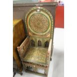 Indo Persian throne/hall chair with heavily painted polychrome geometric decoration.