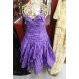 Fashion: Alister Blair, purple taffeta, knee length prom/evening dress with pleated bodice, full