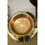 Indo Persian: Brass and copper chaffing bowl with wall fixing bracket. 16" diameter.