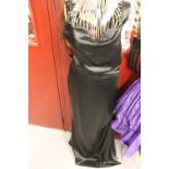 Fashion: Vivienne Westwood, Red label, black satin evening dress, drape bodice, wide shoulder