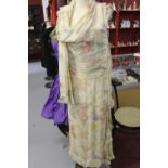 Costume: Anoushka G retailed by Liberty & Co. Ankle length pure silk wedding/evening gown. Blush