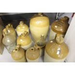 Advertising: Stoneware flagons including 4 and 3 gallon Henry Herman of Bristol, etc (11).