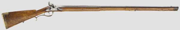 A flintlock shotgun, J. C. Stöhr, Hanau, circa 1810   Blued barrel, octagonal then round after