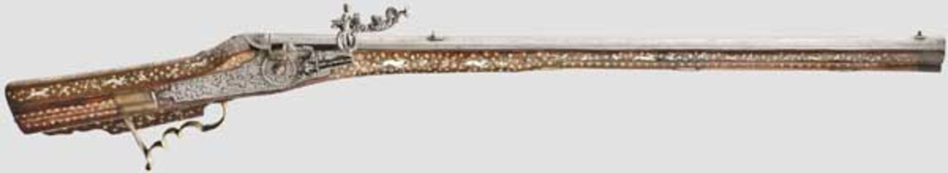 A German wheellock rifle, circa 1680, with bone inlays from historicism period   Octagonal barrel,