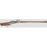 A German wheellock rifle, circa 1680, with bone inlays from historicism period   Octagonal barrel,