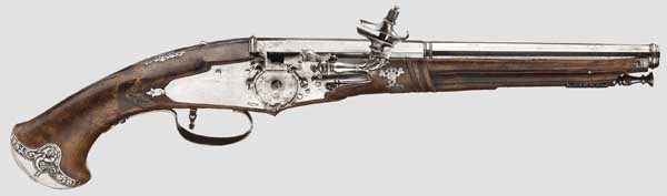 An Italian wheellock pistol, circa 1650   Octagonal, after baluster twelve-fold faceted barrel