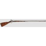 A chiselled Italian flintlock rifle, circa 1700   Octagonal, after chiselled baluster round and