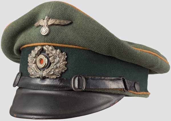 Schirmmütze für Mannschaften der Krad-Schützen Eigentumsstück um 1936. Elegante hohe Sattelform,