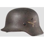 A steel helmet M 40, Luftwaffe, SD 80 % rough blue-grey paint, 90 % national emblem decal, shell